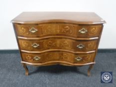 A continental inlaid serpentine fronted three drawer chest CONDITION REPORT: 75cm