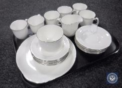 A tray containing a twenty-one piece Royal Albert Platino tea service