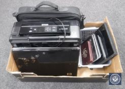 A box containing HP laptop in bag, Epson printer,