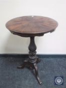 A Victorian pedestal wine table