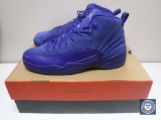 A pair of Nike Air Jordan 12 Retro Deep Royal Blue and White basketball sneakers, size UK 11,