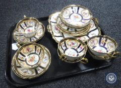 A tray of nineteen pieces of Paragon gilded tea china CONDITION REPORT: Comprising