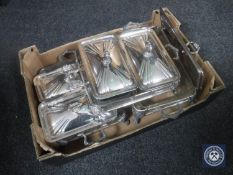 A box containing 20th century plated tureens with glass liners