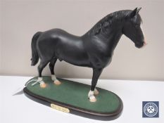 A Beswick figure - Welsh Cob stallion on plinth in a matt black finish