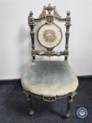 A Victorian ebonised and gilt bedroom chair