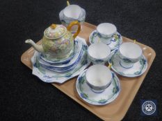 A tray containing eighteen-piece hand painted Delphine tea service,