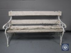A Victorian cast iron and wood garden bench