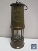 A brass Eccles Protector Type 6 miner's lamp