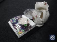 A tray of assorted collector's plates, antique pottery wash jug,