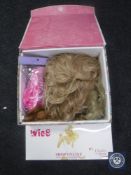 A quantity of wigs.