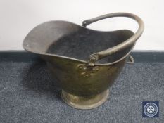 A 19th century brass coal helmet