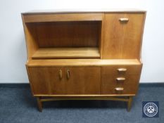 A 1970's teak sideboard