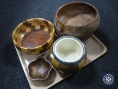 A tray containing five treen bowls