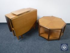 A teak drop leaf table,