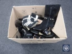 A crate of miscellaneous ladies' boots and shoes, all brand new and never worn.