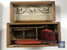 An antique pine cased Direct Current Electric Machine,