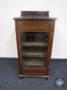 A late Victorian mahogany music cabinet