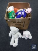 A crate containing ten miscellaneous soft toys - teddy bears, woollen craft animals, etc.