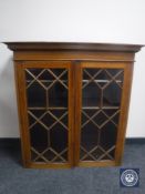 A Victorian inlaid mahogany bookcase top