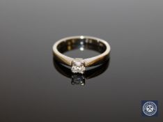 An 18ct white gold square cut diamond solitaire, approximately 0.26ct, size L 1/2.