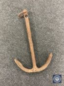An antique cast iron anchor