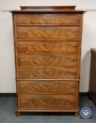 A 19th century continental mahogany seven drawer chest,