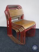 A set of seven mid 20th century tubular metal framed stacking chairs