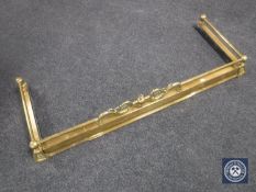 A brass extending fire curb