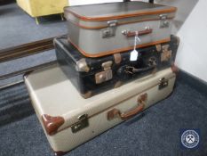 Three vintage luggage cases