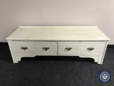 A painted Victorian two drawer wardrobe base