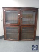 A Victorian mahogany glazed bookcase with four glazed panel doors,