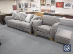 A contemporary three seater settee,