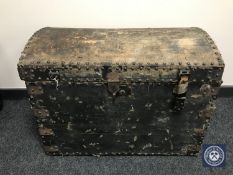 An antique pine dome top trunk