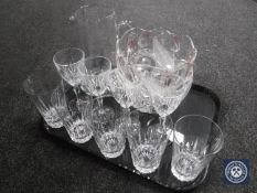A tray containing assorted drinking glasses, two cut glass bowls,