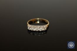 An 18ct gold five stone diamond ring,