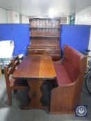 A five-piece pine dining room suite comprising of dresser, refectory table,