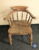 An antique captains armchair