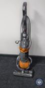 A Dyson DC25 upright vacuum cleaner