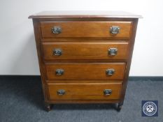 An Edwardian mahogany Art Nouveau four drawer chest