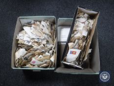 Three boxes of a large quantity of 20th century loose stamps, an Oppens stamp album,