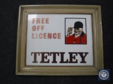 A framed Tetley Free Off Licence sign