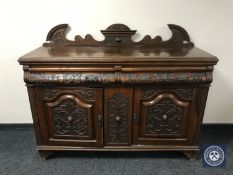 A heavily carved Victorian mahogany sideboard a/f