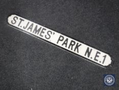 A hand painted wooden sign - St James's Park