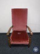 A twentieth century oak framed bedroom chair upholstered in a pink dralon