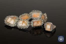 A continental silver filigree cameo panel bracelet together with the matching ring.