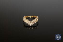 An 18ct gold diamond double wishbone ring