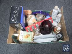 A box of Spanish figures, glass ware, wall plates,