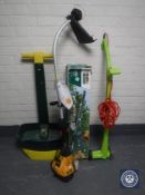 A JCB petrol strimmer together with an electric strimmer,