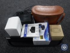 A tray of Royal Doulton picture frame, dash cam, two pairs of binoculars,