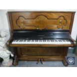 A walnut cased overstrung piano by Kiobenhavn